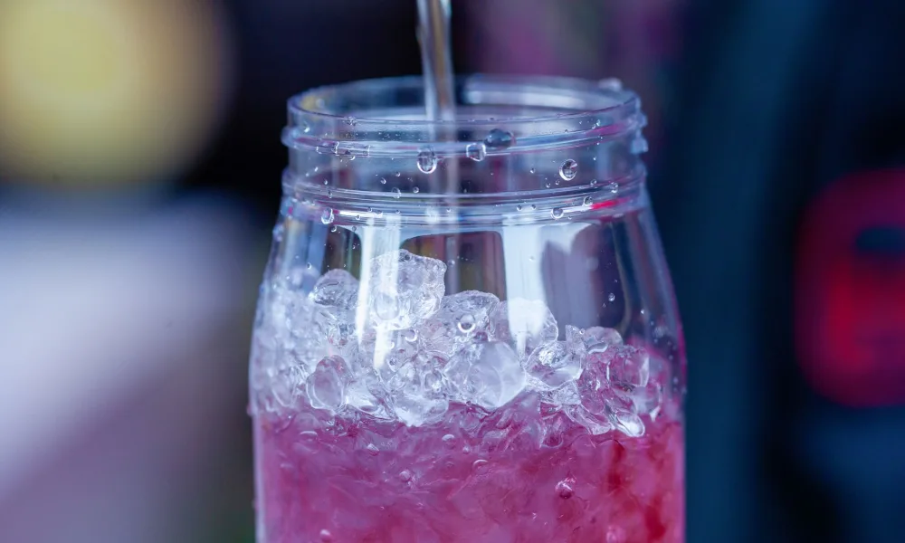 hollow cylindrical bullet ice cubes from portable ice maker close up