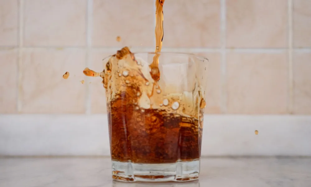 overfilled countertop ice maker water tank spilling over
