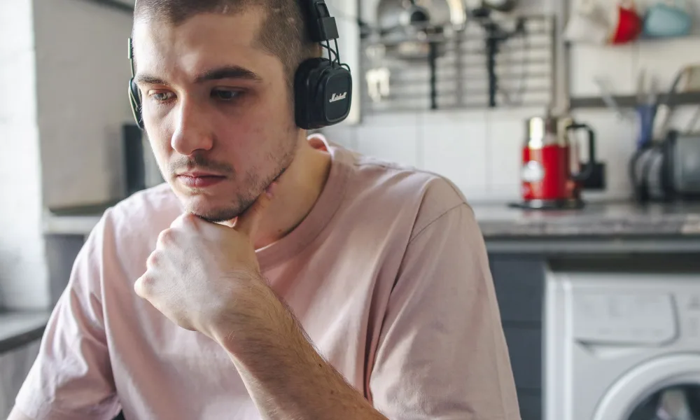 person listening to loud rattling countertop ice maker