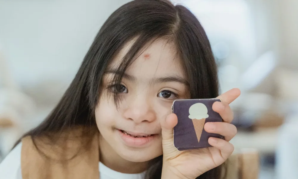 person tasting a piece of ice with a puzzled expression