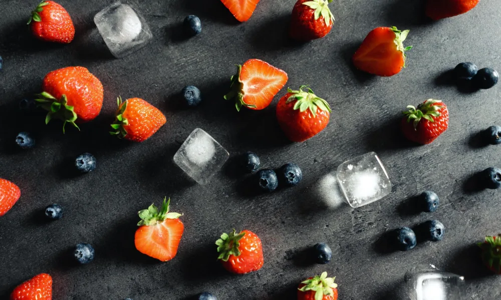 small and large bullet ice cubes side by side from portable ice maker