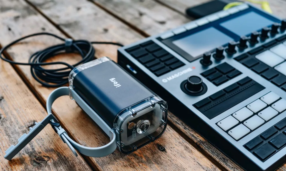 portable ice maker connected to portable power station battery outdoors