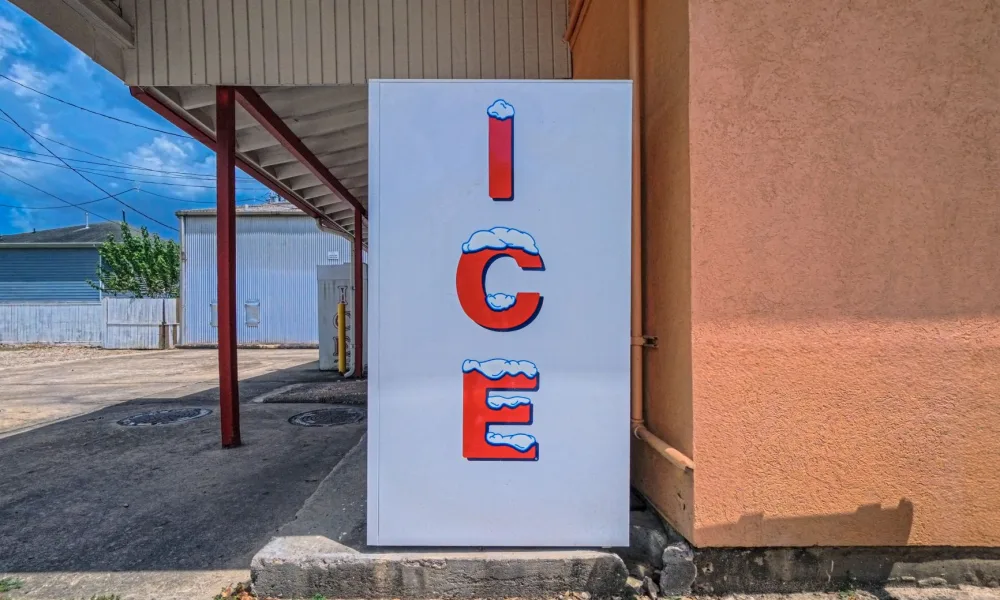 portable countertop ice maker beside a plumbed built-in ice machine